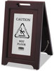 A Picture of product RCP-1867508 Rubbermaid® Commercial Executive 2-Sided Multi-Lingual Wooden Caution Sign,  Brown/Stainless Steel,15 x 23 1/2