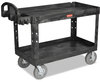 A Picture of product RCP-4546BLA Rubbermaid® Commercial Heavy-Duty Utility Cart,  Two-Shelf, 26w x 55d x 33 1/4h, Black